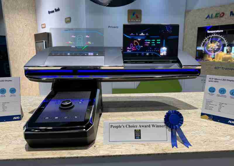 万利车用Micro LED Display HMI解决方案获”最佳车用显示奖”，，以用户为中心开发，，，针对前座驾驶与乘客设计兼具娱乐与安全的高画质屏幕，，包含车舱前座的Micro LED透明屏幕及全球首款内建镜头的智慧Micro LED显示器